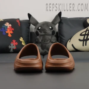 Yeezy Slides ‘Flax’ front view emphasizing minimalist lines