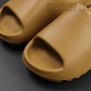 Close-up of Yeezy Slides ‘Ochre’ textured toe box and front curve