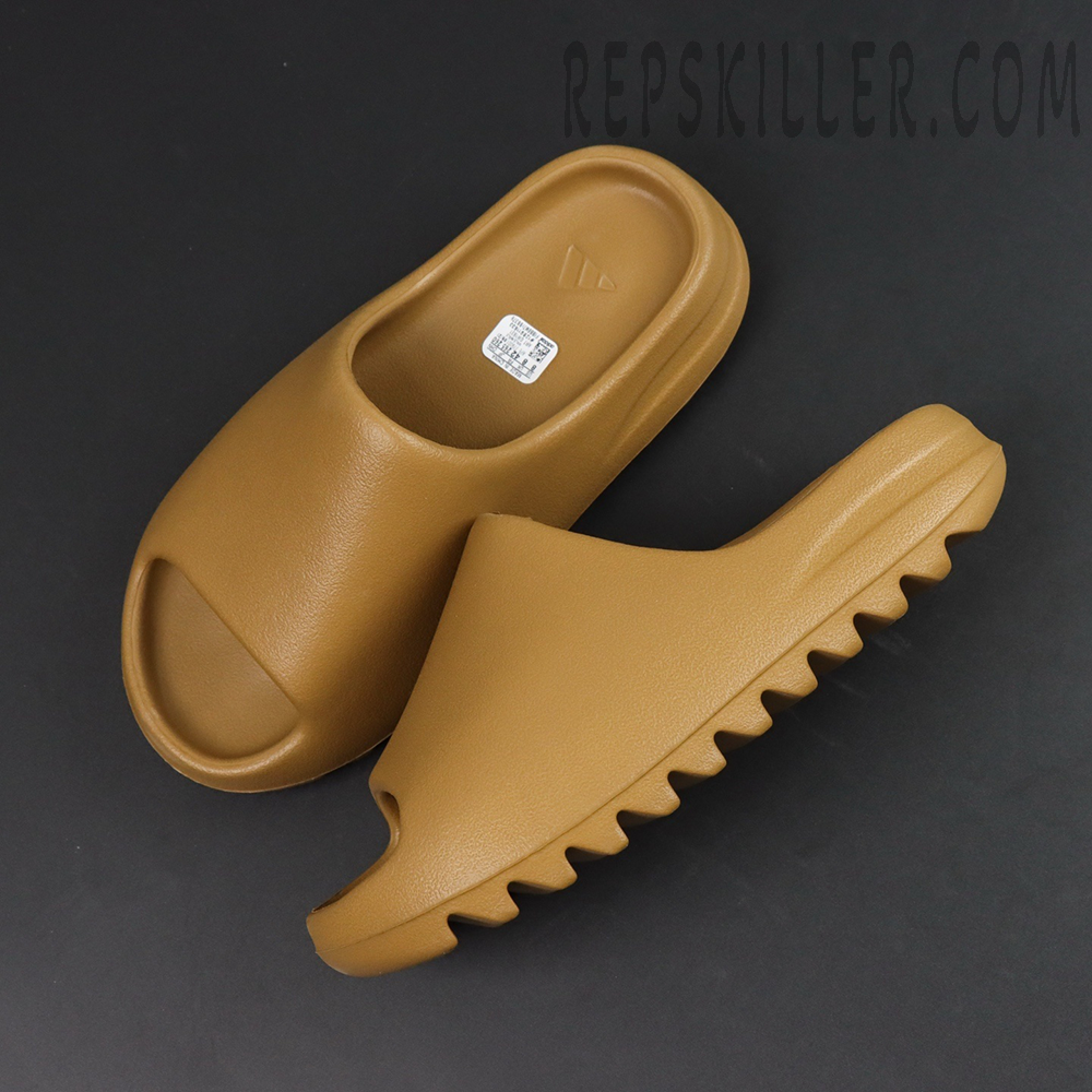 Flat lay of Yeezy Slides ‘Ochre’ showing upper and outsole design