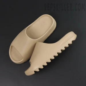 Yeezy Slides ‘Pure’ top and side view highlighting unibody construction