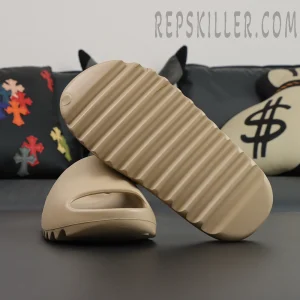 Yeezy Slides ‘Pure’ outsole view showing horizontal traction grooves
