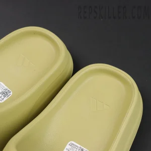 Yeezy Slides ‘Resin’ 2022 insole view with subtle adidas logo embossing.