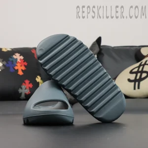 Bottom sole view of the Yeezy Slides ‘Slate Marine’ featuring ridged traction.