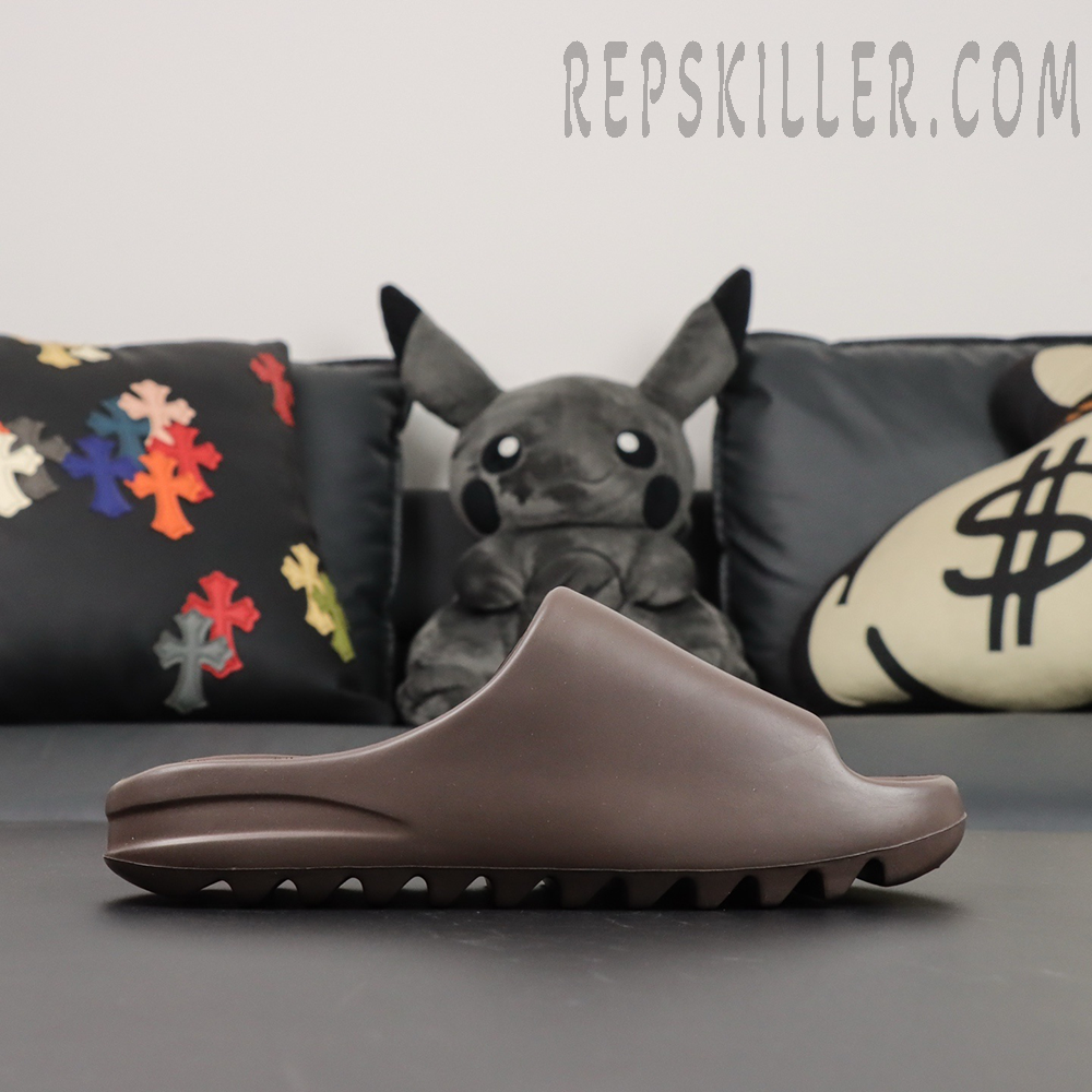 Yeezy Slides ‘Soot’ medial view highlighting the smooth, sculpted shape