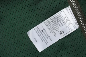 Adidas × Brain Dead V-Neck Sweatshirt Wash tag