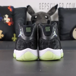 Air Jordan 11 Retro GS ‘Inner Beast’ — Rear heel shot highlighting embroidered Jumpman logo and lime green accents.