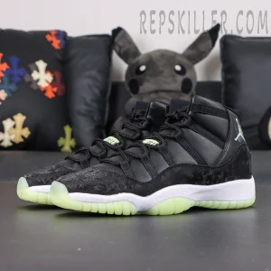 Air Jordan 11 Retro GS ‘Inner Beast’ — Front angle showing unique lacing structure and reflective green branding tag.
