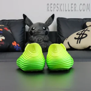 Nike ReactX Rejuven8 ‘Green Strike’ rear heel view on black sofa background