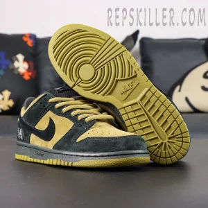 Nike Supreme x Dunk Low SB “Camper Green” outsole and upper detail featuring olive rubber sole and premium suede construction.