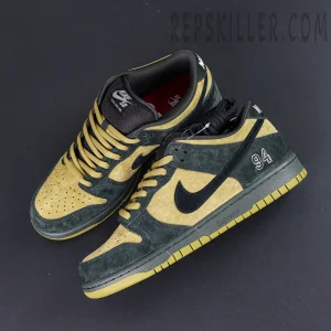Nike Supreme x Dunk Low SB “Camper Green” top-down view showing symmetrical layout and black Swoosh logo.