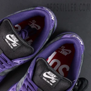 Nike Supreme x Dunk Low SB “Ink” inner collar view showing Nike SB tongue label and red Supreme insole print.