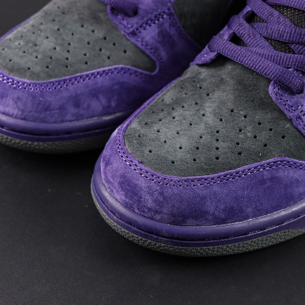 Nike Supreme x Dunk Low SB “Ink” close-up of toe box with fine perforations and dual-tone suede texture.
