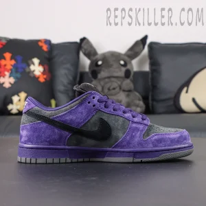 Nike Supreme x Dunk Low SB “Ink” lateral side view emphasizing contrast between deep purple and dark grey tones.