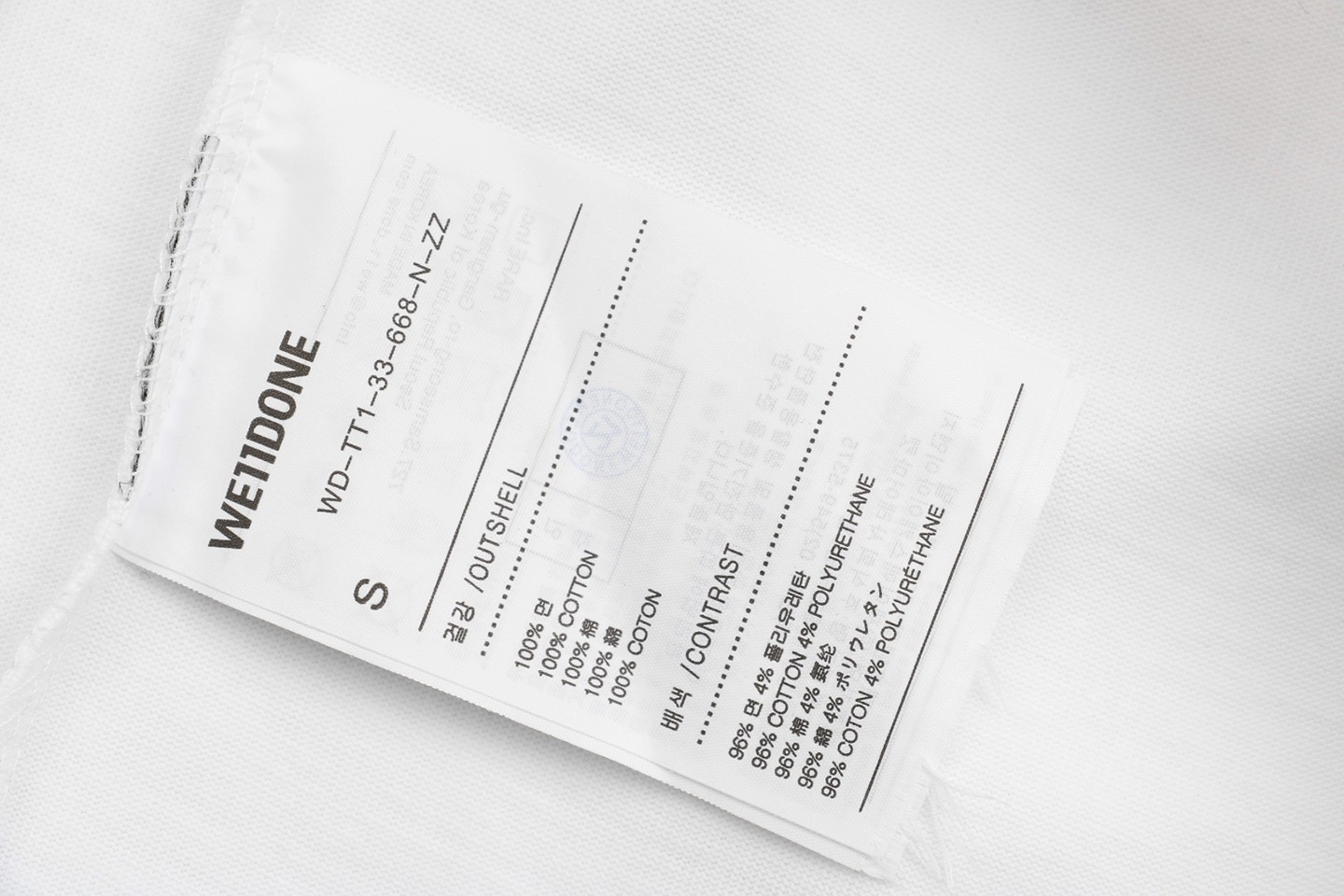 We11done Repetitive Hand-Drawn Logo Graphic Shirt White Wash tag