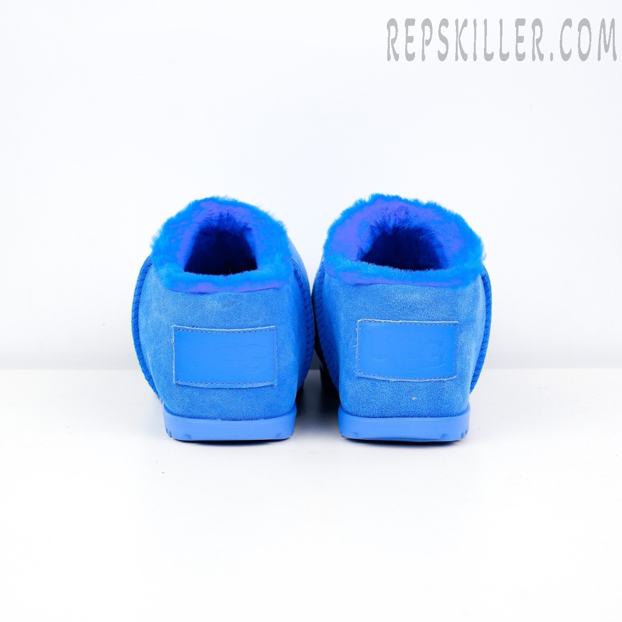 Wmns Pumped Slide Blue Heels