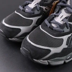 Close-up of ASICS GEL-NYC “Graphite Grey Black” toe box showing suede overlays and mesh texture.