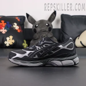 Side profile of ASICS GEL-NYC “Graphite Grey Black” featuring dark mesh and synthetic overlays.