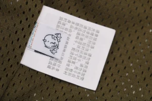 Bape × Saint Michael Collaborative Logo Tape Camo Track Pants Wash label