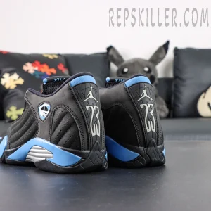 Back view of Air Jordan 14 Retro “Black University Blue” showing Jumpman logo and number 23 on heel with blue accents.