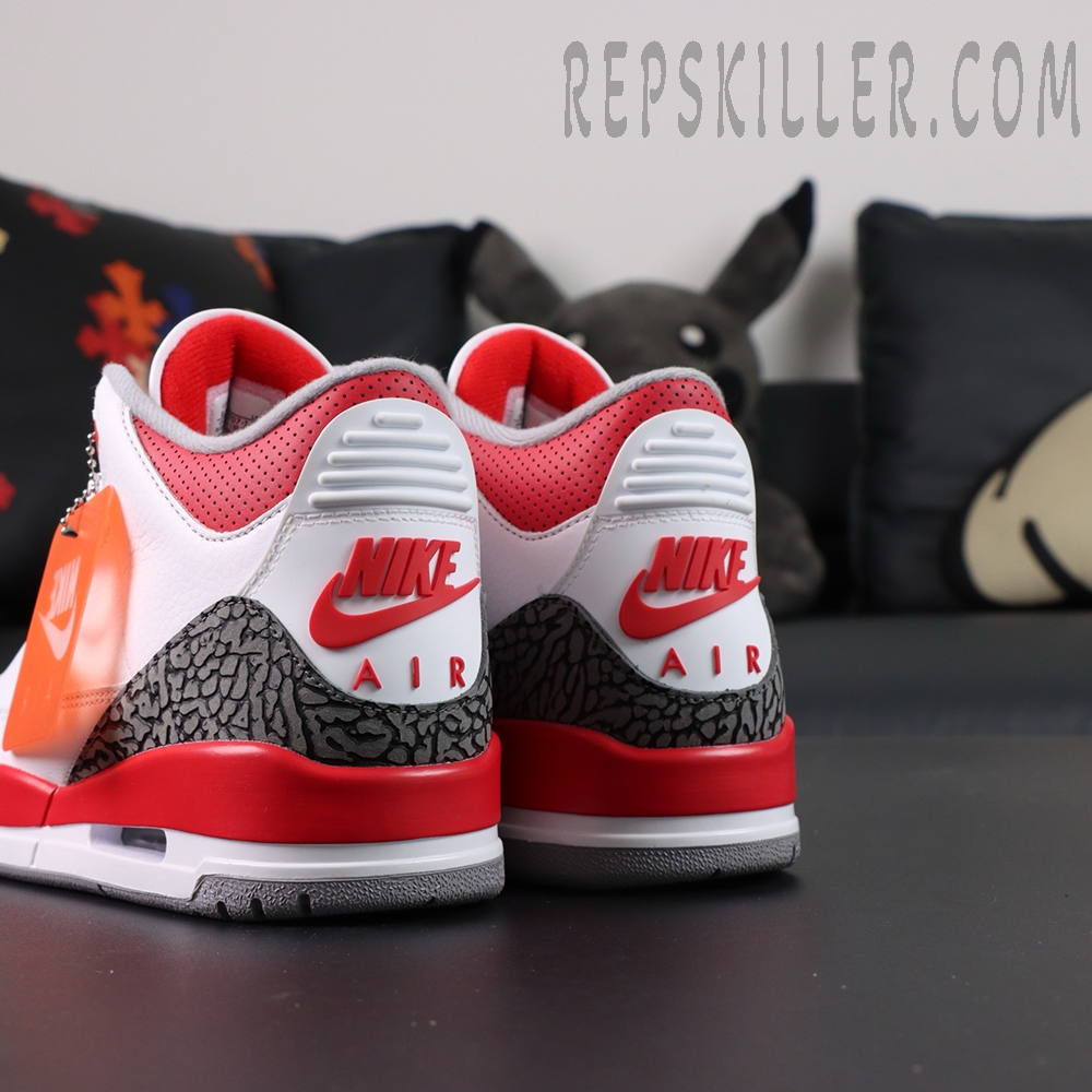 Rear angle of Air Jordan 3 Retro “Fire Red” 2022 showing Nike Air logo on heel tab.