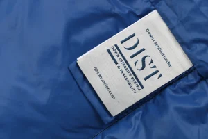 Mxxcler Longue Saison “Blue Puffer Badge” Down Vest Wash label