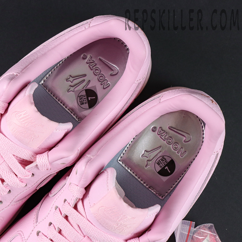 Overhead view of NOCTA x Nike Air Force 1 Low “Pink Foam” showing silver insoles with NOCTA branding.