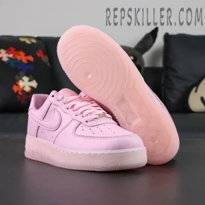Outsole and side view of NOCTA x Air Force 1 “Pink Foam” showing circular traction and engraved “Love You Forever.”