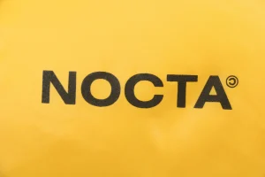 Nike x Drake NOCTA Stand Collar Down Jacket Yellow Back Print