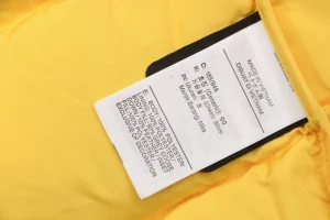 Nike x Drake NOCTA Stand Collar Down Jacket Yellow Wash label