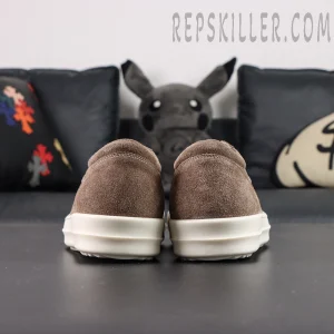 Rear view of DRKSHDW Porterville Vintage Low “Dust Milk” showing clean heel structure and plush suede finish.