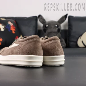 Rear angled view of DRKSHDW Porterville Vintage Low “Dust Milk” showing suede heel panel and stacked sole.