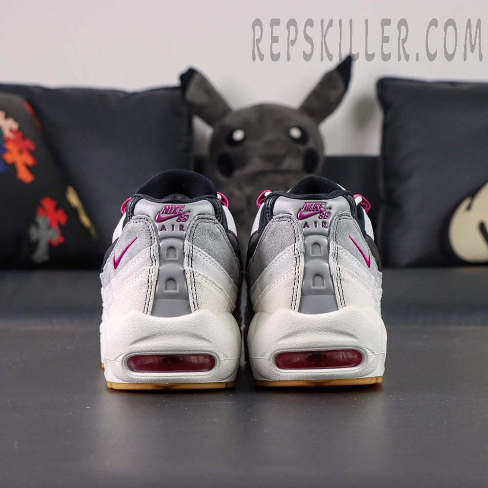 Rear view of Nike SB x Air Max 95 “Cactus Flower” featuring gradient grey upper, pink Air units, and Nike Air heel logo.