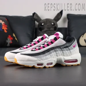 Three-quarter angle of Nike SB x Air Max 95 “Cactus Flower” emphasizing magenta detailing and multi-layered design.