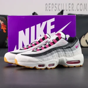 Nike SB x Air Max 95 “Cactus Flower” displayed with purple Nike box, showcasing urban-inspired grey and pink gradient design.