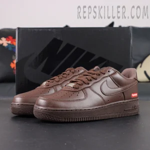 Sup x Air Force 1 Low SP ‘Box Logo - Baroque Brown’ with black Nike shoebox and red Supreme tag on heel