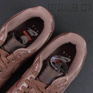 Top view of Sup x Air Force 1 Low SP ‘Box Logo - Baroque Brown’ showing Nike Air and Supreme co-branded insoles