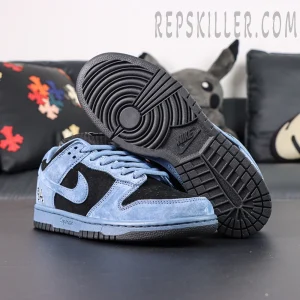 Close-up of Supreme x Nike SB Dunk Low “Ocean Fog” outsole and side profile, showing the black sole and blue suede overlays.