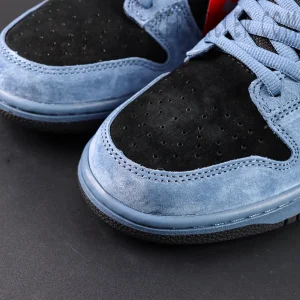 Close-up of the toe box of Supreme x Nike SB Dunk Low “Ocean Fog,” showing fine suede texture and perforations.