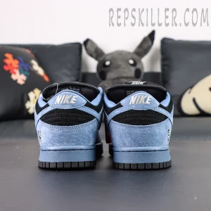 Back angle view of Supreme x Nike SB Dunk Low “Ocean Fog,” highlighting layered blue and black suede materials.