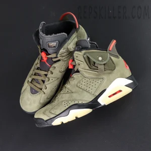Overhead view of Travis Scott x Air Jordan 6 “Olive” showing both shoes and cargo-style pocket flap.