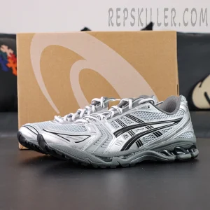 Urban Research x ASICS Gel-Kayano 14 “Pure Silver Black” with box in background, showcasing metallic silver upper and black stripes.