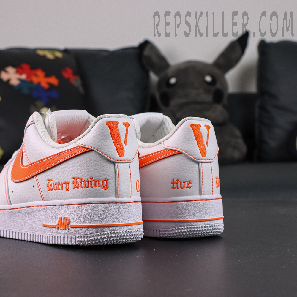 Rear heel view of Vlone x NikeLab Air Force 1 ‘White’ with orange “V” logo embroidery