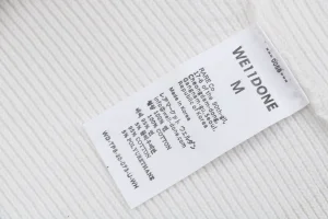 We11done Small WE Logo High-Neck Knit Sweater White Wash label