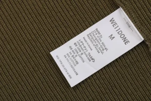 We11done Small WE Logo High-Neck Knit Sweater Green Wash label