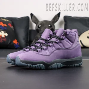 Front angled view of the Jordan 11 Retro ‘Mojave’ highlighting the purple upper and dark outsole.