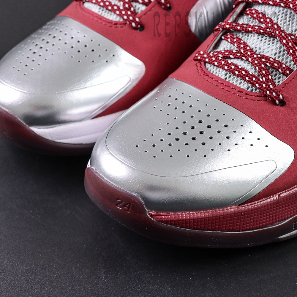 Detailed view of metallic silver toebox and perforations on Kobe 5 Protro ‘Lower Merion Aces’.