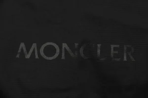 Mxxcler x 1017 ALYX 9SM Triple-Zip Hooded Down Jacket Black Brand label