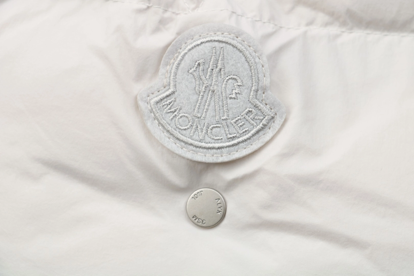 Mxxcler x 1017 ALYX 9SM Triple-Zip Hooded Down Jacket White Brand label