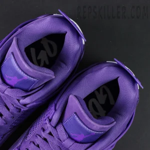 Top-down view of the Nigel Sylvester x Jordan 4 Purple highlighting padded collars and interior insole graphics.