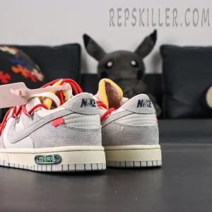 Angled heel shot of Off-White x Nike Dunk Low Lot 33 of 50 highlighting suede texture and Off-White text details.